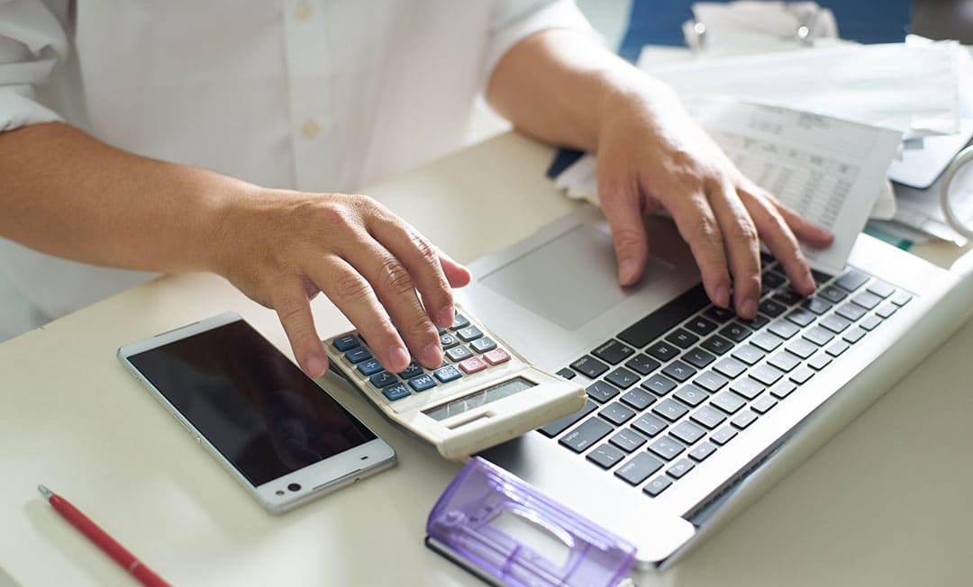 financing-man-with-calculator-1080x652 financing-man-with-calculator-1080x652